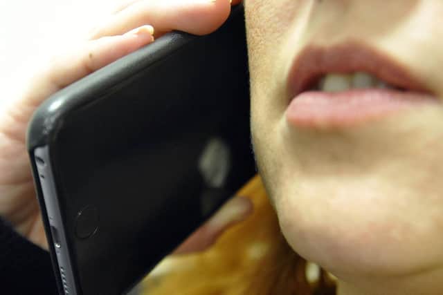 Residents were urged to be vigilant after reports of scam callers posing as police officers.