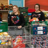 Aldi donated surplus food from all its stores to local charities and foodbanks when stores closed early on Christmas Eve. L-R: Emily Sutton,  Carla Louise Gospel and Tamara Mawson-Phipps (Aldi staff).
Credit: SWNS