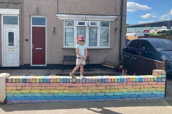 Ismay Bowyer on her Pride Month wall.