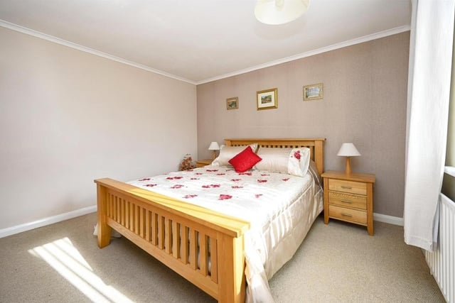 All three bedrooms at the £350,000 house are a good size, including this one, which faces the front of the property.
