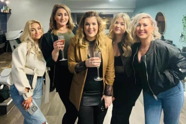 Business owner Beckie Blore (centre) with Grace Lowe, Sarah Randell, Rosie Howard and Samantha Scaysbrook who work at The Hairloft Hairdressing on Knifesmithgate, Chesterfield.