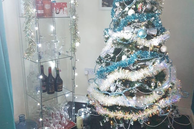 Deborah Macmillan added some festive sparkle to her furniture as well as her tree with tinsel.