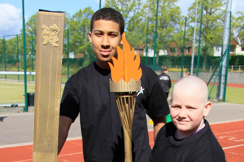 Holding their Olympic torches Tait Wragg, from Ilkeston Academy, and Brandan Rowland, from Ormaston enterprise Academy, at a Mini Olympics event for Ilkeston schoolchildren.