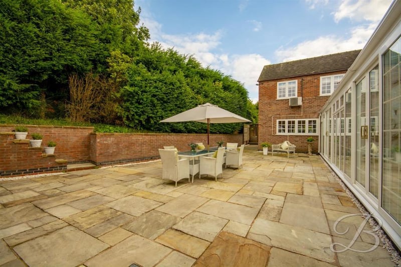 An attractive patio area is one of the highlights of the outside space. Imagine spending pleasant summer's evenings here.