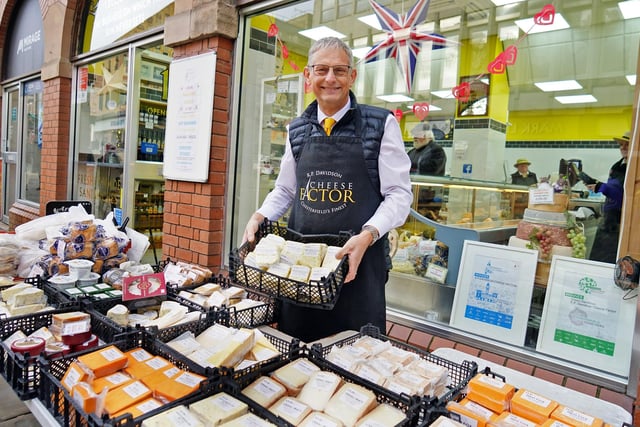 Cheese heaven! Simon Davidson setting up the stall outside his shop., located in Chesterfield market hall