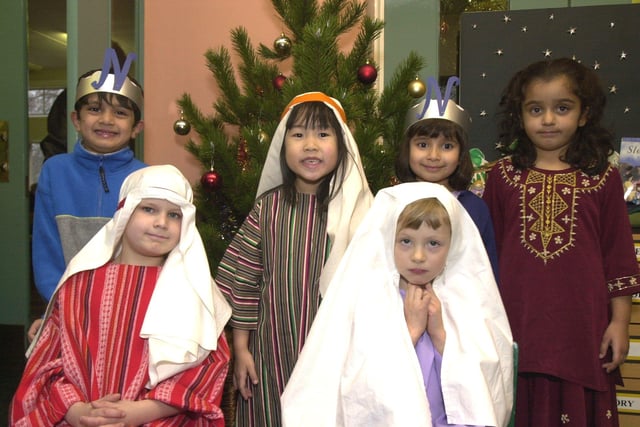 Pictured at the Holt House Infants school in 2001 where joint Christmas and Eid celebrations were held for Christian and Muslim faiths. Seen LtoR frount are,  Joseph Ball, and Iona McCewan. Back LtoR, Ameer Nadeem, Annalise, Lam, Salina Ahmed, and Amara Ali.
