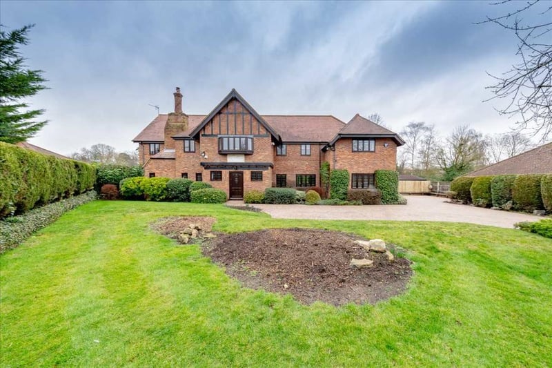 This six bedroom executive home has had the same owners for nearly 25 years. Located at Woughton On The Green, the home features three bathrooms, a panelled grand entrance hall, an inglenook fireplace, and a bespoke hand painted kitchen.