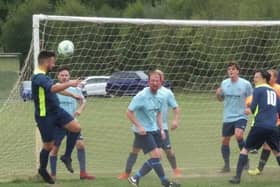 Action from Clay Cross United (light blue) v Dronfield Wanderers. Photo by Martin Roberts.