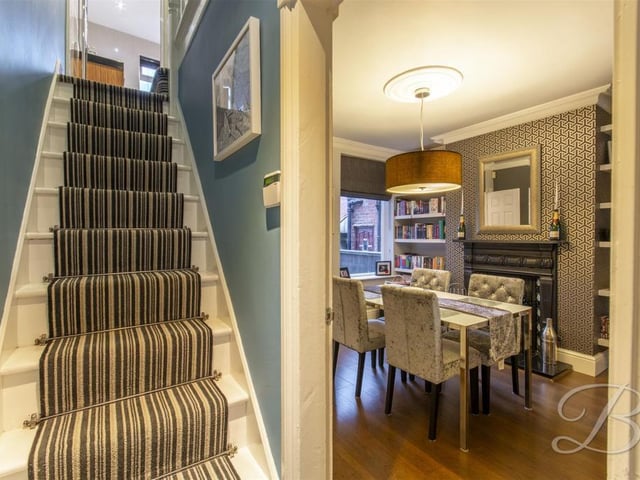 The bright hallway leads to a landing with room for a chest of draws.