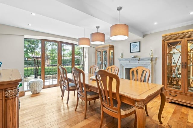 This lovely dining room has patio doors opening to the garden.
