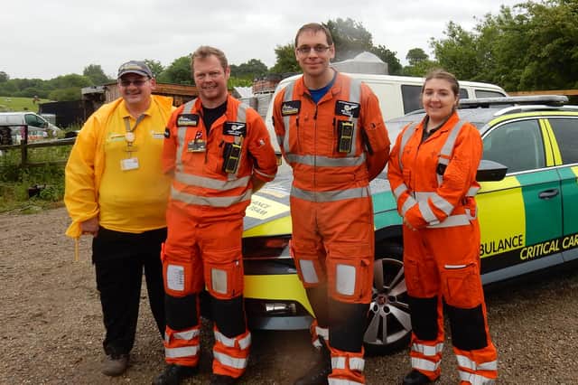 Fundraiser Richard Fletcher with air ambulance crew members