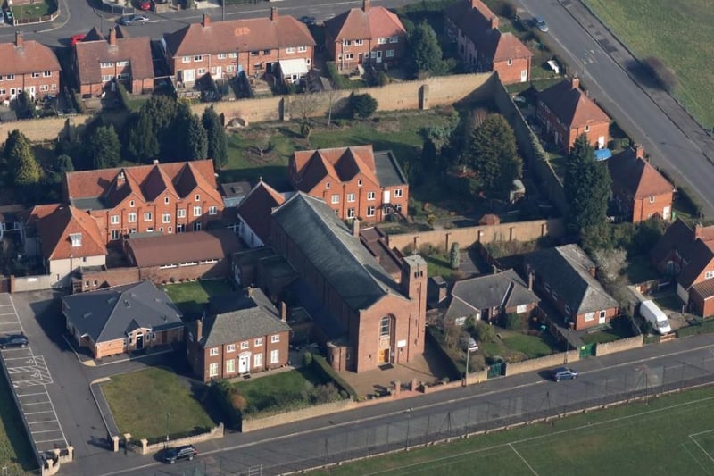 Flying over the Our Lady of Perpetual Succour Church and Poor Clare Colletines Monastery on Brooklyn Road