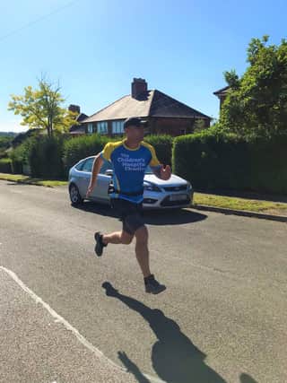 Tom Cotterill has run a half marathon every day this month