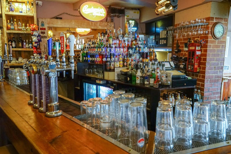 The bar is well-stocked with draught beers, spirits, and plenty more (including bananas)