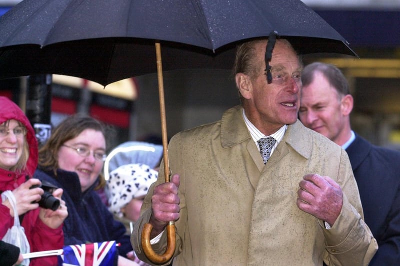 The Duke of Edinburgh braving the rain in Chesterfield in 2003.