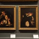 ‘A Girl Reading a Letter with an Old Man Reading over her Shoulder’ and ‘Two Boys Fighting Over a Bladder’ by Joseph Wright of Derby in the Joseph Wright Gallery at Derby Museum and Art Gallery (photo: Oliver Taylor - Derby Musems)