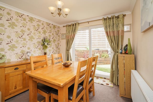 Step out into the rear garden from the dining room which is accessed through the lounge.