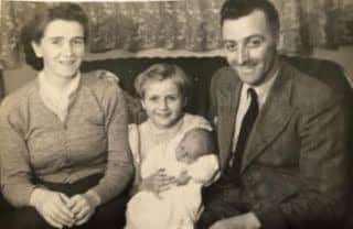 Margaret and Frank with their children Jennifer (Jen)  and Stephen on Stephen's christening day in 1954.