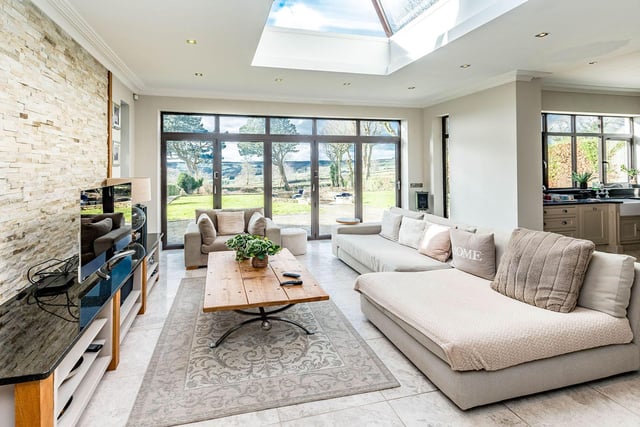 Called an 'orangery' by the estate agents, this area of the house has a skylight and views of the garden.