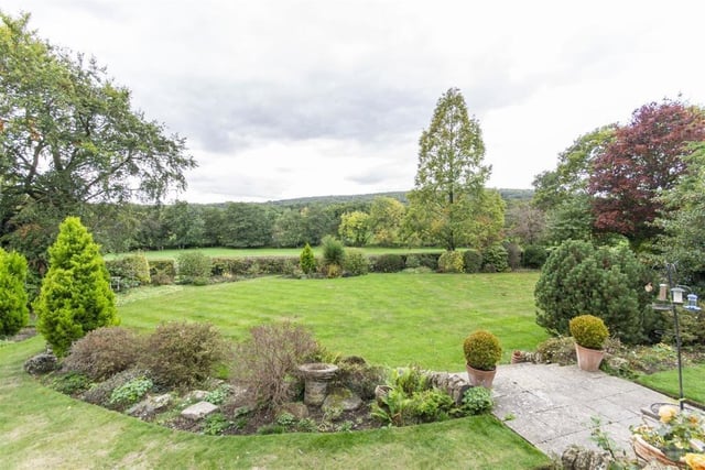 The garden looks out onto open farmland and nearby Hardwick Wood.
