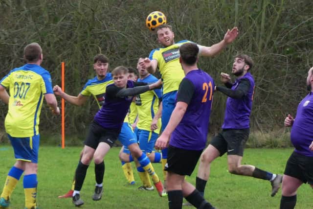 Action from the HKL Division Five game between Tupton (yellow) and Town CFC. All photos by Martin Roberts.