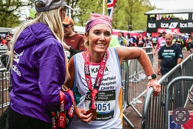 Katya Zafiris with her medal after crossing the finishing line at the London Marathon 2024.