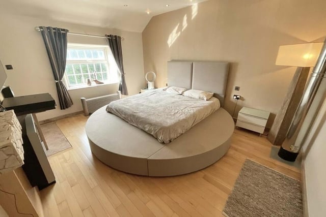 A sophisticated and stylish look to the master bedroom.