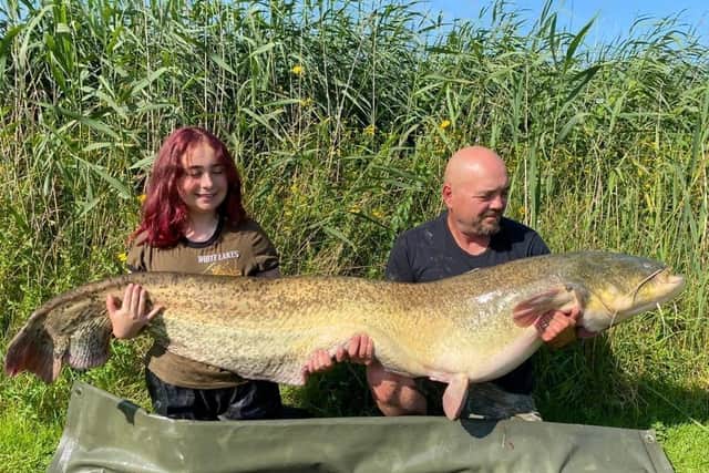 Hannah Truscott and her dad Paul with her catch