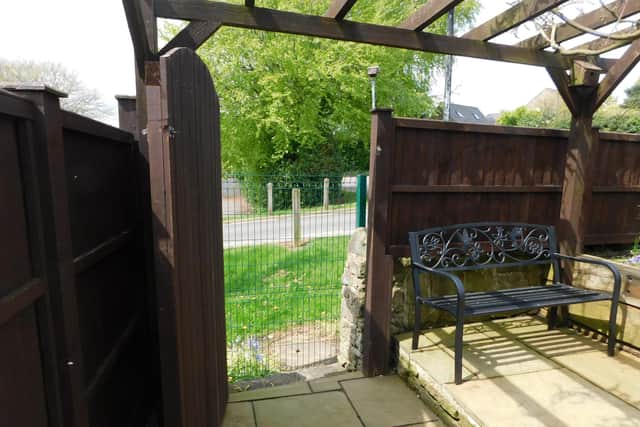 One of the homeowners says she had not opened her garden gate since the fence was installed because it has upset her so much