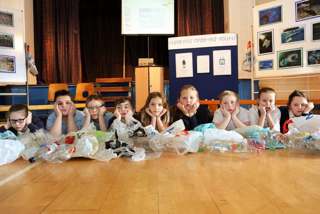 Year 5 pupils from Spire Junior School pile up plastic waste as an example of the rubbish that is finding it's way into the oceans as part of a presentation to parents at a special assembly.