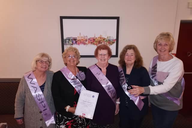Pictured centre is Angela Madden alongside some fellow Derbyshire WASPI campaigners Lesley Hardy, Moira Holland, Janet Atkinson and Denise Baker
