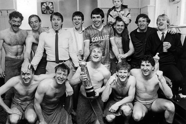 Chris Marples, pictured centre holding the Canon League Division Four championship trophy, in May 1985, after the last game of the season. 
