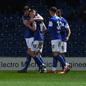 Chesterfield skipper Will Evans congratulates Liam Mandeville after his goal which put the Spireites 2-1 up.
