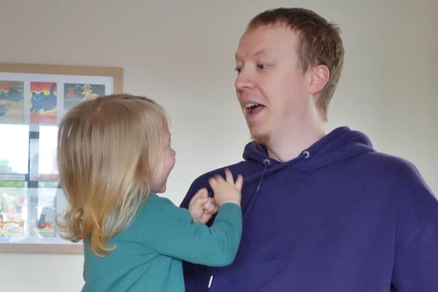 Wesley Bell with his two-year-old daughter Natasha. The family need to raise £60,000 for neck fusion surgery in Barcelona.