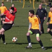 Action from Grassmoor Reserves (red) v AFC Tiki in a ten-goal thriller. Photo by Martin Roberts.