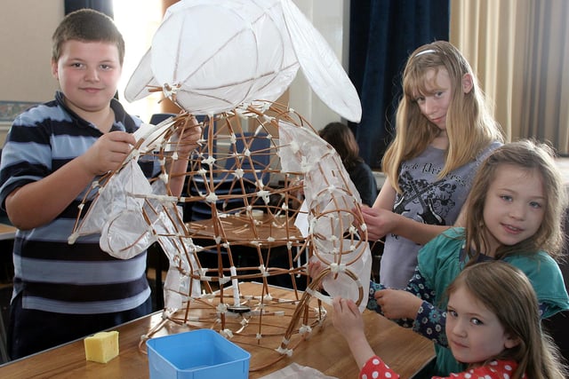 Working on a giant Womble lantern for the torch light procession, Rhys and Abbie Barlow and Laura and Molly Duffin pictured in 2008