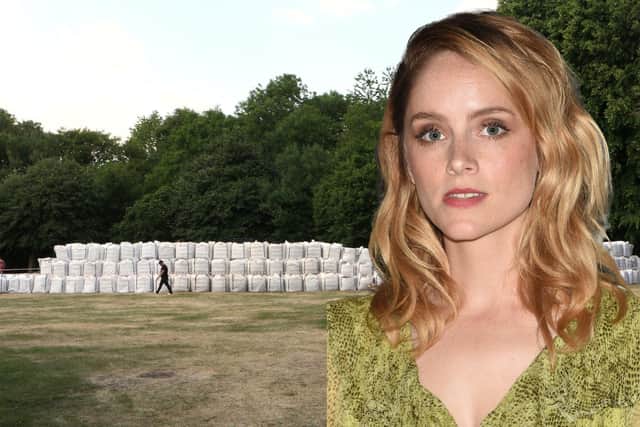 The sandbag levee being built in a New Mills park as a set for ITV's After the Flood and Sophie Rundle, who is featuring in the show.  (Photo by Stuart C. Wilson/Getty Images)