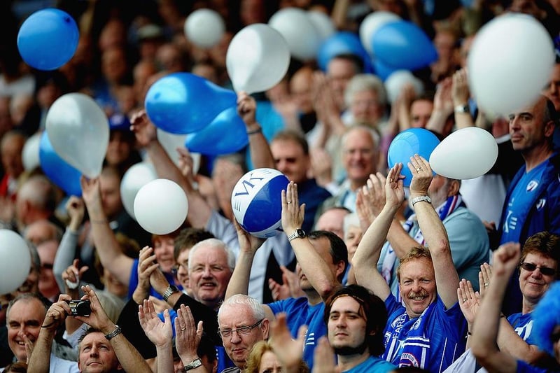 Chesterfield Fans cheer the team out during the npower League Two match between Chesterfield and Gillingham at the B2Net Stadium on May 7, 2011.