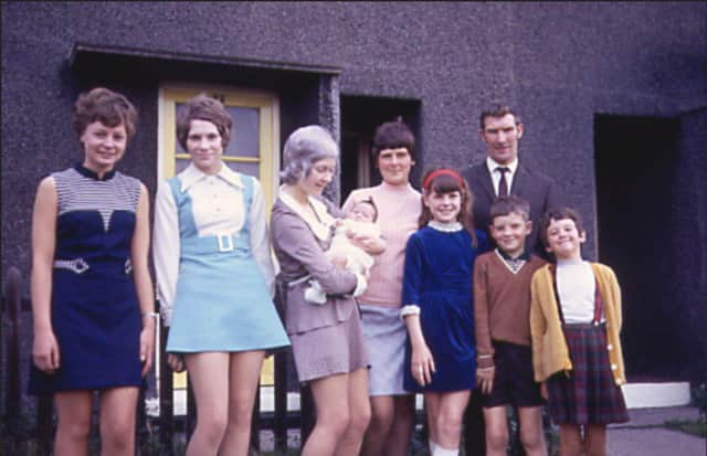Irene, second from left, with her family in the 1960s.