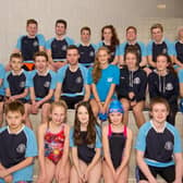 Members of Ilkeston Swimming Club pose for a team picture.