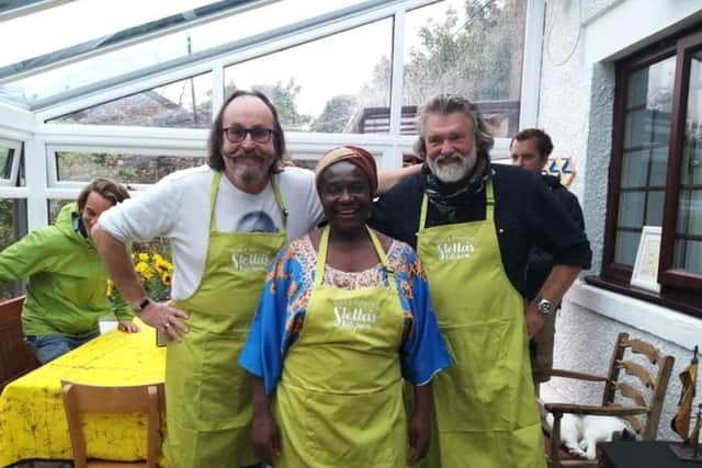 Dave and Si with Stella Kisob Knowles on a visit to Stella's kitchen restaurant