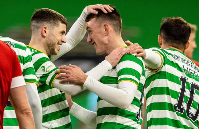 David Turnbull celebrates with Ryan Christie after scoring to make it 1-0 to Celtic against Aberdeen (Photo by Alan Harvey / SNS Group)