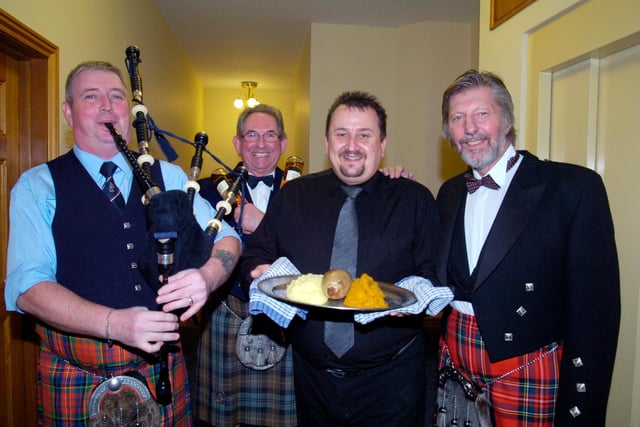 Burns Night at Doncaster Golf Club in 2012. l/r Pete Tait (Piper), Arthur Radford (Whisky bearer), George Cousins (Maitre d) and Dave Ketteridge (Addressing the haggis)