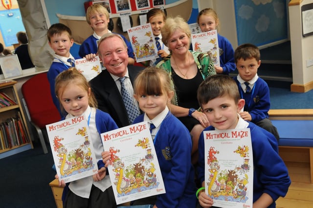 Pupils from St Bega's RC Primary School receive certificates from Coun Jim Ainslie and Headland Library librarian Margaret Dixon. Who remembers this reading event from 2014?