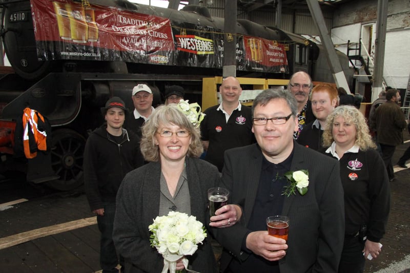 James and Tracey Proctor from Killamarsh held their wedding reception at the Rail Ale festival in 2013, five years after they first met there. The happy couple is pictured with festival organisers.