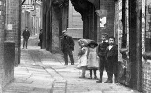 Children near the Royal Oak pub in The Shambles. The street was named after the Fleshamols on which butchers laid out the meat for sale in the 1400s.