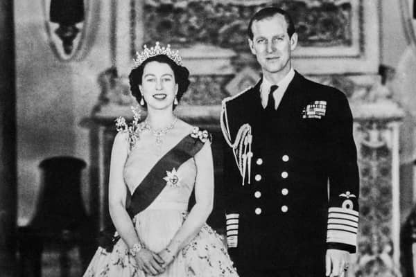 Queen Elizabeth II poses with Prince Philip, Duke of Edinburgh, on June 2, 1953, before her coronation, in London. (Photo by INTERCONTINENTALE / AFP) (Photo by -/INTERCONTINENTALE/AFP via Getty Images)