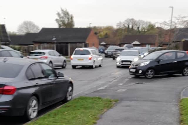 Orchard Close Junction with King Street, Clowne. The proposed junction where Bolsover District Council wants to add an access point for a new housing development. Typical congestion at pick time from Clowne Junior School. Picture submitted