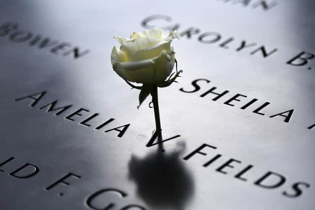 A white rose left at the 9/11 Memorial & Museum in New York  as the US commemorates the  anniversary of the 9/11 attacks. (Photo by ANGELA WEISS/AFP via Getty Images)