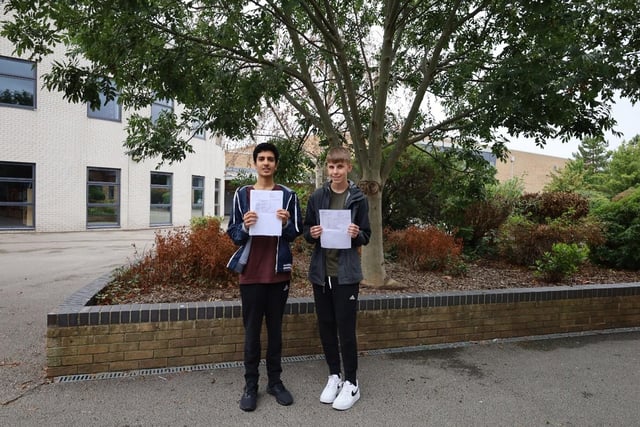 Rishan Mason and Joshua Swain posed for a photo after collecting their GCSEs